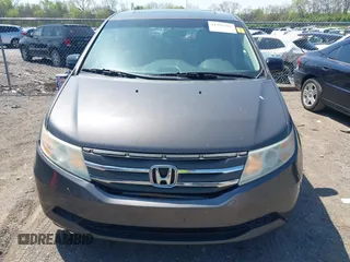 2013 Honda Odyssey EX-L with VIN 5FNRL5H65DB011071, listed as a IAAI auction lot 41992265 with 192,624 mi miles and . Bid and sale history available at DreamBid. Image 12.