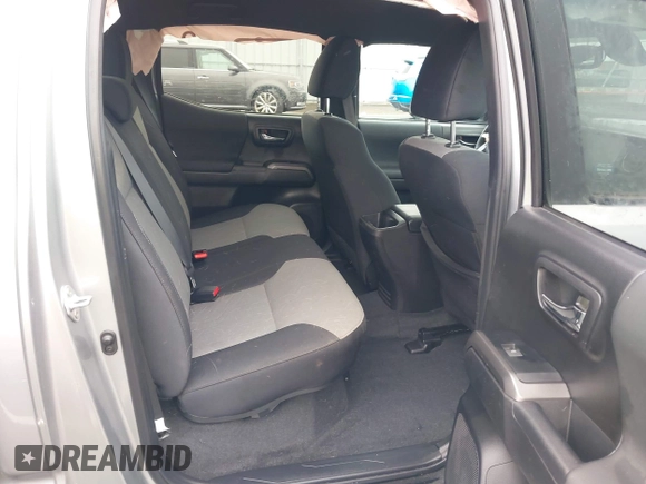 2023 Toyota Tacoma SR5 z VIN 3TMDZ5BN6PM156824, wystawiony jako IAAI lot #41031932 z przebiegiem 14 226 mil mil oraz . Historia ofert i sprzedaży dostępna na DreamBid. Obrazek 8.