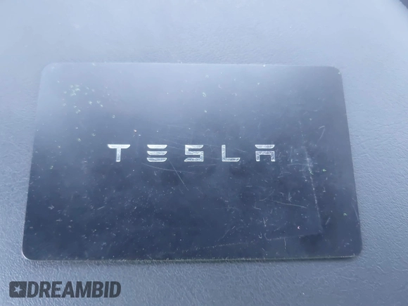 2023 Tesla Model Y Long Range with VIN 7SAYGDEEXPA129790, listed as a IAAI auction lot 41735721 with 20,402 mi miles and . Bid and sale history available at DreamBid. Image 11.