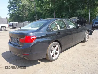 2014 BMW 3 Series 320i xDrive with VIN WBA3C3C56EK200175, listed as a IAAI auction lot 42617731 with 96,596 mi miles and . Bid and sale history available at DreamBid. Image 4.