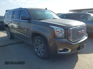 2015 GMC Yukon XL Denali with VIN 1GKS1JKJ2FR737663, listed as a IAAI auction lot 41524746 with 120,788 mi miles. Bid and sale history available at carsss.com. Image 1.