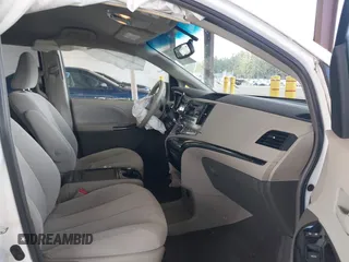 2014 Toyota Sienna LE AAS with VIN 5TDKK3DC4ES505293, listed as a IAAI auction lot 42021409 with 70,319 mi miles. Bid and sale history available at carsss.com. Image 5.