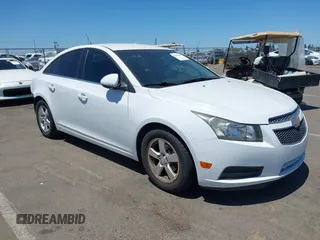 2014 Chevrolet Cruze 1LT z VIN 1G1PC5SB3E7106029, wystawiony jako IAAI lot #42342248 z przebiegiem 112 674 mil mil oraz . Historia ofert i sprzedaży dostępna na DreamBid. Obrazek 1.