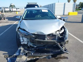 2019 Toyota Corolla L z VIN 2T1BURHE1KC178056, wystawiony jako IAAI lot #42116388 z przebiegiem 28 141 mil mil oraz . Historia ofert i sprzedaży dostępna na DreamBid. Obrazek 13.