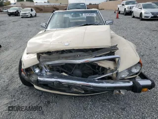 1986 Mercedes-Benz 560 SL with VIN WDBBA48D9GA042092, listed as a Copart auction lot 82438564 with 43,758 mi miles and Salvage Title. Bid and sale history available at DreamBid. Image 5.