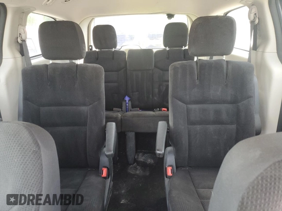 2019 Dodge Grand Caravan SE with VIN 2C4RDGBG2KR777707, listed as a Copart auction lot 46870455 with 129,404 mi miles and Clean Title. Bid and sale history available at DreamBid. Image 10.