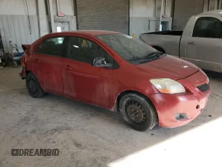 2009 Toyota Yaris with VIN JTDBT903891313898, listed as a Copart auction lot 87820085 with 212,806 mi miles and Salvage Title. Bid and sale history available at carsss.com. Image 4.