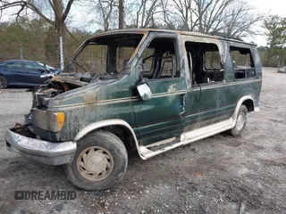 1999 Ford Econoline Cargo with VIN 1FDRE14W8XHB48532, listed as a IAAI auction lot 41513497 with Not Provided miles. Bid and sale history available at carsss.com. Image 2.