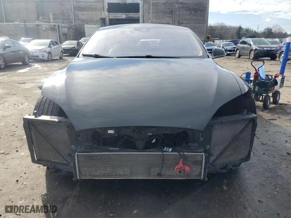 2015 Tesla Model S 85D with VIN 5YJSA1H49FF087538, listed as a Copart auction lot 85415524 with 94667 miles and Salvage Title. Bid and sale history available at carsss.com. Image 5.