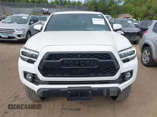 2023 Toyota Tacoma SR z VIN 3TMCZ5AN1PM637609, wystawiony jako IAAI lot #40345917 z przebiegiem 12 614 mil mil oraz . Historia ofert i sprzedaży dostępna na DreamBid. Obrazek 12.