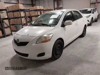 2009 Toyota Yaris with VIN JTDBT903994054207, listed as a IAAI auction lot 41991534 with 176,820 mi miles. Bid and sale history available at carsss.com. Image 2.