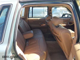 1994 Lincoln Town Car Signature with VIN 1LNLM82W5RY616904, listed as a IAAI auction lot 41811628 with 163,653 mi miles. Bid and sale history available at carsss.com. Image 8.