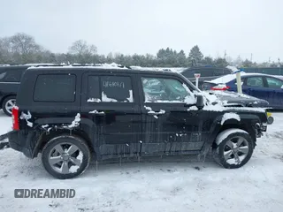 2015 Jeep Patriot High Altitude with VIN 1C4NJPFA8FD413720, listed as a IAAI auction lot 41610171 with 109,944 mi miles and . Bid and sale history available at DreamBid. Image 14.