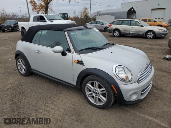 2012 MINI Convertible with VIN WMWZN3C57CT135185, listed as a Copart auction lot 78580644 with 83,027 mi miles and Salvage Title. Bid and sale history available at DreamBid. Image 4.