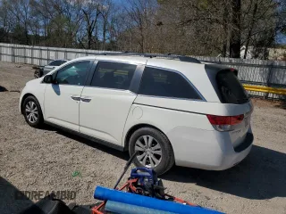 2016 Honda Odyssey EX-L with VIN 5FNRL5H69GB003379, listed as a Copart auction lot 48932295 with 144,904 mi miles and Salvage Title. Bid and sale history available at DreamBid. Image 2.