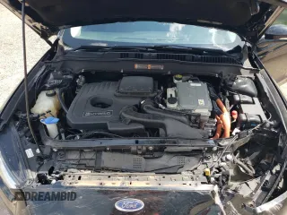 2016 Ford Fusion Titanium Hybrid with VIN 3FA6P0RUXGR204106, listed as a Copart auction lot 62769015 with 106,826 mi miles and Salvage title. Bid and sale history available at DreamBid. Image 11.