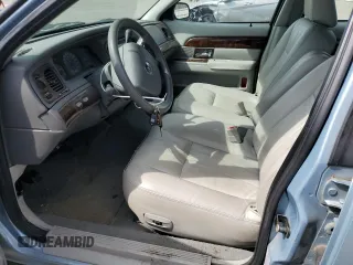 2005 Mercury Grand Marquis GS z VIN 2MEFM74W75X603444, wystawiony jako Copart lot #54395945 z przebiegiem 110 933 mil mil oraz Czysty tytuł • Clean title. Historia ofert i sprzedaży dostępna na DreamBid. Obrazek 7.