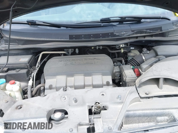 2012 Honda Odyssey Touring with VIN 5FNRL5H91CB121950, listed as a IAAI auction lot 42456620 with 200,831 mi miles and . Bid and sale history available at DreamBid. Image 10.