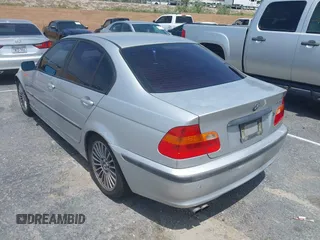 2002 BMW 3 Series 325i with VIN WBAET37452NG73105, listed as a IAAI auction lot 42105774 with 202,852 mi miles. Bid and sale history available at carsss.com. Image 3.