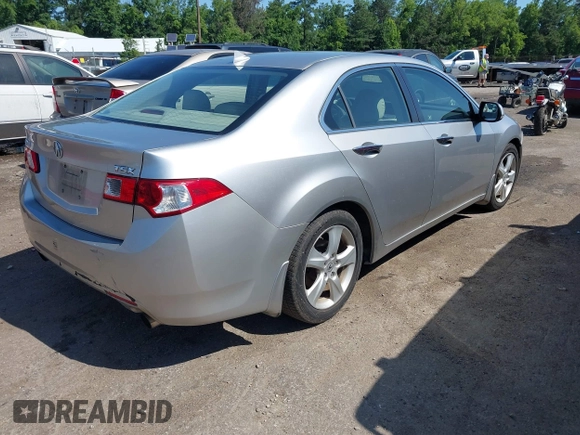 2009 Acura TSX with VIN JH4CU26659C021798, listed as a IAAI auction lot 42565155 with 196,024 mi miles and . Bid and sale history available at DreamBid. Image 4.
