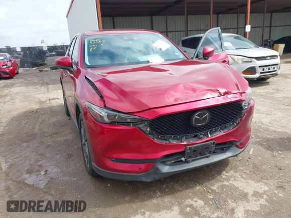 2018 Mazda CX-5 Grand Touring with VIN JM3KFADM7J1357401, listed as a IAAI auction lot 42106012 with 119,420 mi miles and . Bid and sale history available at DreamBid. Image 6.