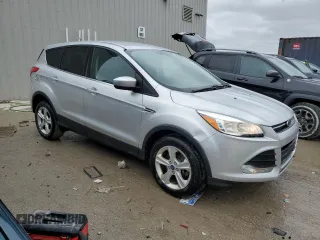 2014 Ford Escape SE with VIN 1FMCU9GX1EUD16169, listed as a Copart auction lot 52760165 with 148,179 mi miles and Clean title. Bid and sale history available at DreamBid. Image 4.