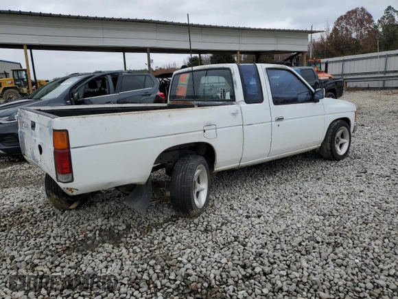 1990 Nissan Frontier with VIN 1N6SD16S9LC404281, listed as a Copart auction lot 84214904 with 279,270 mi miles and Salvage title. Bid and sale history available at DreamBid. Image 3.