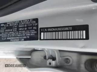 2014 Kia Rio EX with VIN KNADN4A36E6338670, listed as a IAAI auction lot 42035501 with 166,561 mi miles. Bid and sale history available at carsss.com. Image 9.