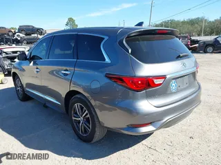 2016 Infiniti QX60 with VIN 5N1AL0MN5GC502797, listed as a IAAI auction lot 41242329 with 212,317 mi miles. Bid and sale history available at carsss.com. Image 3.