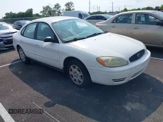 2007 Ford Taurus SE z VIN 1FAFP53U37A154407, wystawiony jako IAAI lot #42397653 z przebiegiem 204 342 mil mil oraz . Historia ofert i sprzedaży dostępna na DreamBid. Obrazek 1.