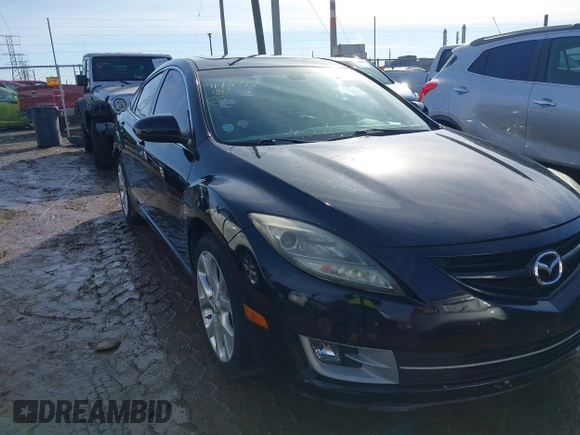 2009 Mazda 6 S Grand Touring with VIN 1YVHP82B195M23577, listed as a IAAI auction lot 41491398 with 180,512 mi miles and . Bid and sale history available at DreamBid. Image 1.