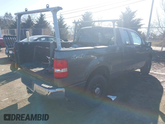 2005 Ford F-150 STX with VIN 1FTRX14W95NB07100, listed as a IAAI auction lot 41627990 with 381,000 mi miles. Bid and sale history available at carsss.com. Image 4.