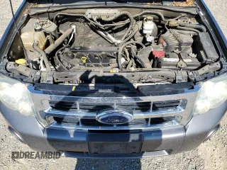 2009 Ford Escape XLS z VIN 1FMCU02729KA14846, wystawiony jako Copart lot #61658205 z przebiegiem 239 852 mil mil oraz Czysty tytuł • Clean title. Historia ofert i sprzedaży dostępna na DreamBid. Obrazek 11.