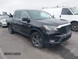 2023 Honda Ridgeline RTL with VIN 5FPYK3F51PB040821, listed as a IAAI auction lot 42408326 with 15,428 mi miles and . Bid and sale history available at DreamBid. Image 1.