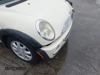 2004 MINI Hardtop with VIN WMWRC33434TJ60941, listed as a IAAI auction lot 39078161 with 143,107 mi miles and . Bid and sale history available at DreamBid. Image 20.