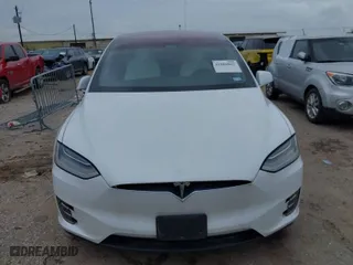 2020 Tesla Model X Long Range with VIN 5YJXCBE23LF233484, listed as a IAAI auction lot 41886062 with 1 mi miles. Bid and sale history available at carsss.com. Image 6.