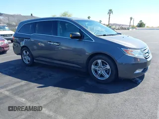 2013 Honda Odyssey Touring with VIN 5FNRL5H95DB045666, listed as a IAAI auction lot 42117219 with 50,715 mi miles and . Bid and sale history available at carsss.com. Image 13.