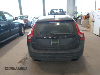 2015 Volvo V60 T5 Drive-E Premier with VIN YV140MEKXF1258073, listed as a IAAI auction lot 41428244 with 57,699 mi miles. Bid and sale history available at carsss.com. Image 16.