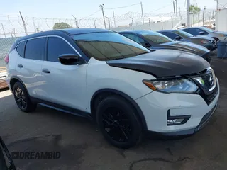 2017 Nissan Rogue SV with VIN KNMAT2MTXHP549123, listed as a IAAI auction lot 42513459 with 111,891 mi miles and . Bid and sale history available at DreamBid. Image 13.