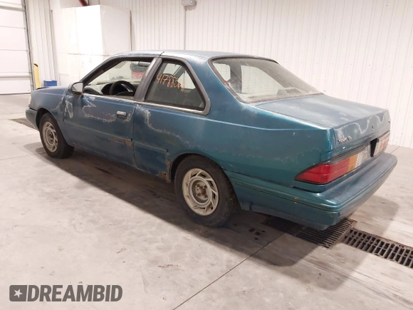 1993 Ford Tempo z VIN 1FAPP31X5PK229656, wystawiony jako IAAI lot #41788568 z przebiegiem 64 620 mil mil oraz . Historia ofert i sprzedaży dostępna na DreamBid. Obrazek 3.