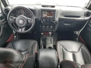 2017 Jeep Wrangler Unlimited Rubicon z VIN 1C4HJWFG6HL692928, wystawiony jako Copart lot #60049775 z przebiegiem 145 033 mil mil oraz Nie do naprawy • Non repairable. Historia ofert i sprzedaży dostępna na DreamBid. Obrazek 8.
