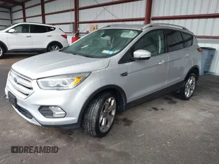 2019 Ford Escape Titanium with VIN 1FMCU9J9XKUA37695, listed as a IAAI auction lot 41868388 with 50,095 mi miles. Bid and sale history available at carsss.com. Image 2.