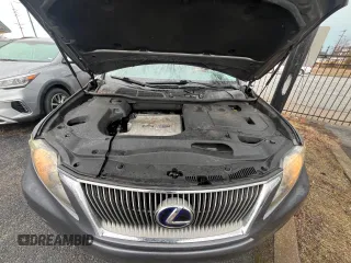 2012 Lexus RX 450h with VIN JTJZB1BA3C2406731, listed as a Copart auction lot 49782595 with 167,699 mi miles and Clean title. Bid and sale history available at DreamBid. Image 7.