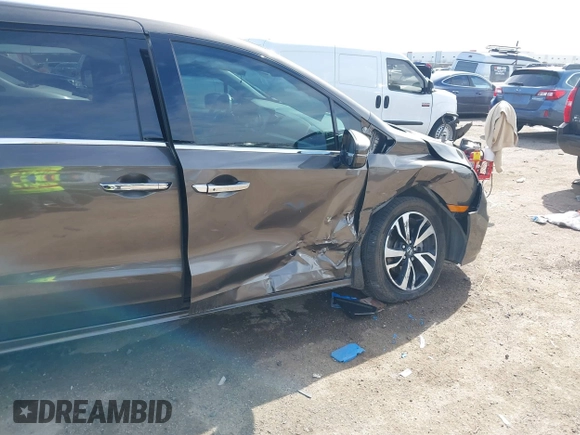 2018 Honda Odyssey Elite with VIN 5FNRL6H96JB069458, listed as a IAAI auction lot 41687526 with 41,004 mi miles and . Bid and sale history available at DreamBid. Image 6.