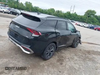 2023 Kia Sportage SX-Prestige with VIN KNDPXCAG3P7077955, listed as a IAAI auction lot 42456463 with 24,699 mi miles and . Bid and sale history available at DreamBid. Image 4.