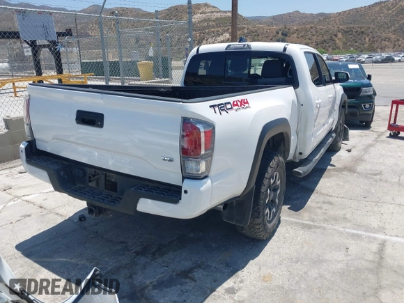 2021 Toyota Tacoma SR5 with VIN 3TMDZ5BN5MM118710, listed as a IAAI auction lot 42460278 with 60,310 mi miles and . Bid and sale history available at DreamBid. Image 4.
