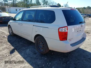 2009 Kia Sedona LX with VIN KNDMB233096312990, listed as a IAAI auction lot 41261428 with 254,323 mi miles. Bid and sale history available at carsss.com. Image 3.