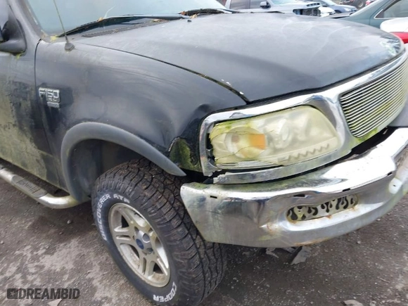 1998 Ford F-150 Standard with VIN 2FTZX1862WCB20580, listed as a IAAI auction lot 41616551 with 195,129 mi miles. Bid and sale history available at carsss.com. Image 6.