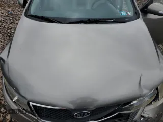 2010 Kia Forte EX z VIN KNAFU4A2XA5250756, wystawiony jako Copart lot #58743405 z przebiegiem 204 266 mil mil oraz Szkoda całkowita • Salvage title. Historia ofert i sprzedaży dostępna na DreamBid. Obrazek 11.