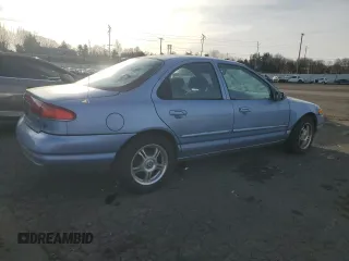1996 Mercury Mystique z VIN 1MELM6532TK639432, wystawiony jako Copart lot #41884055 z przebiegiem 134 991 mil mil oraz Tytuł czysty. Historia ofert i sprzedaży dostępna na DreamBid. Obrazek 3.